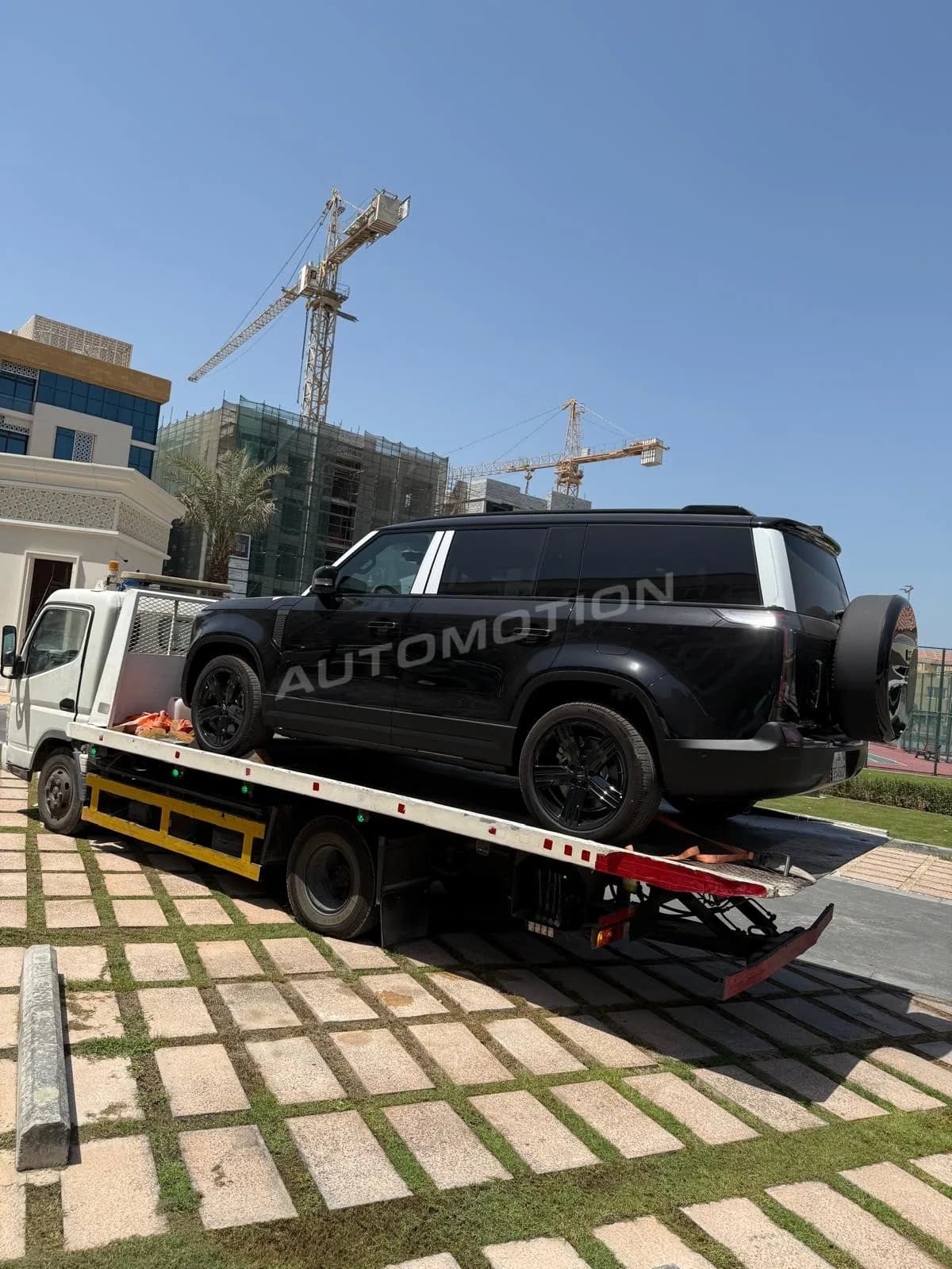 Delivery photograph 2 of 8, a vehicle loaded in a shipping container