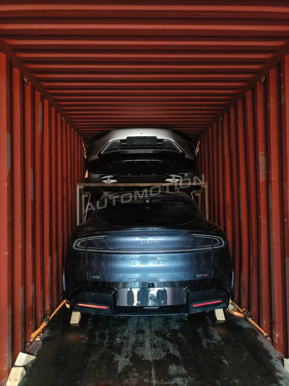 Delivery photograph 1 of 8, a vehicle loaded in a shipping container