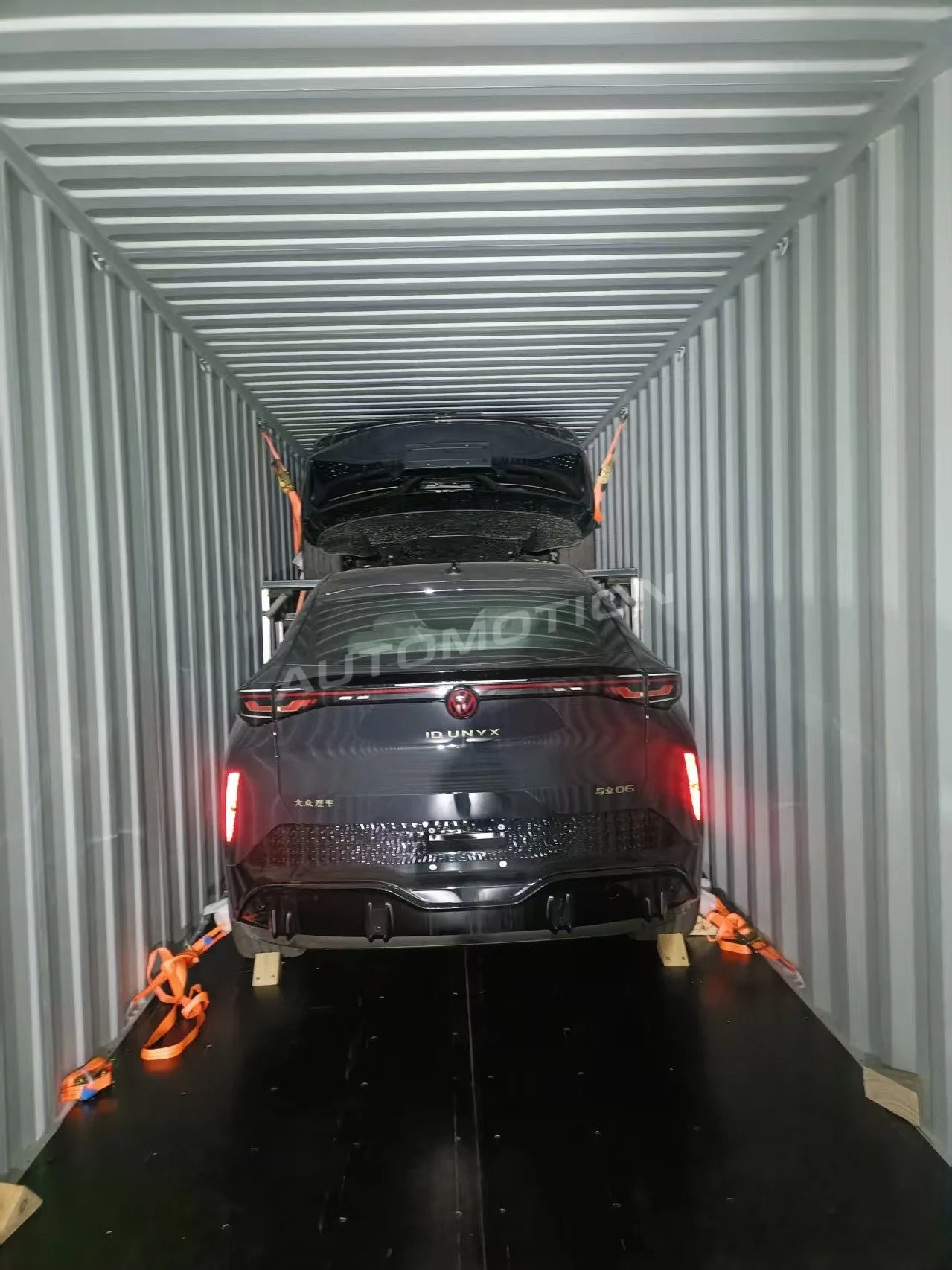 Delivery photograph 9 of 24, a vehicle loaded in a shipping container