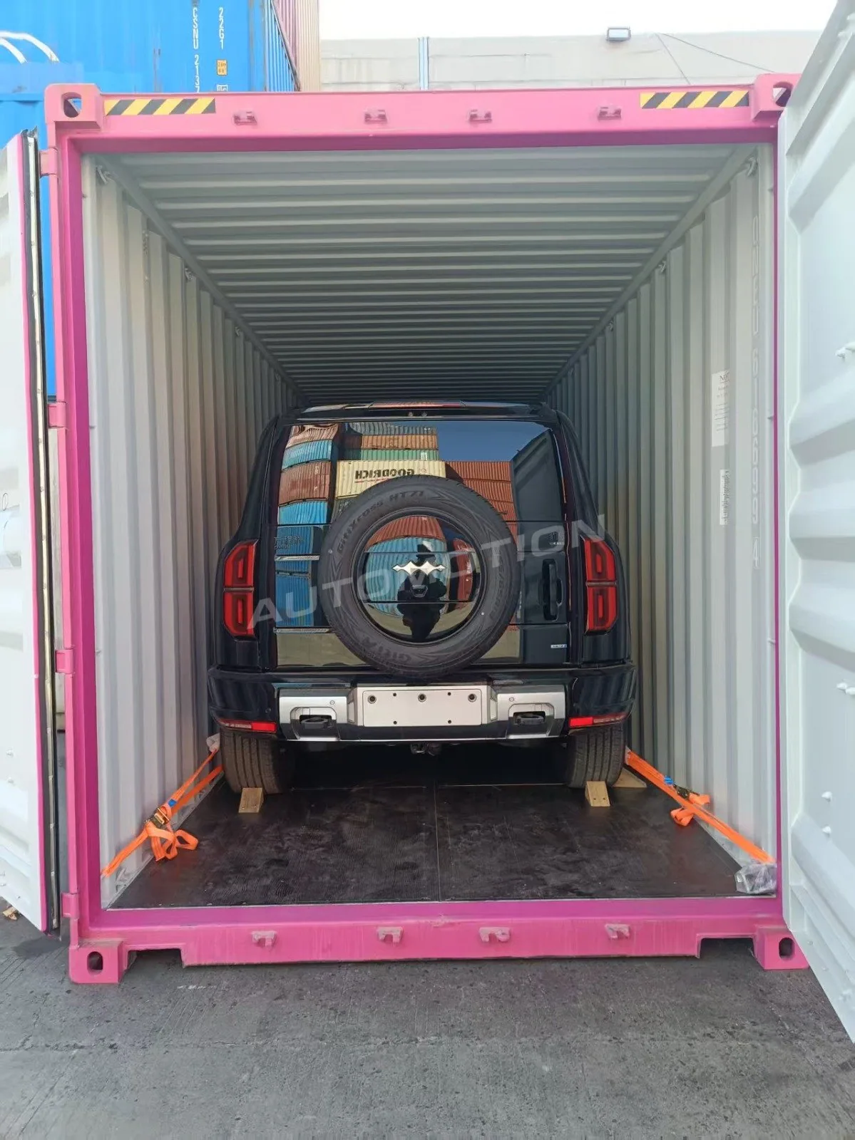 Delivery photograph 7 of 8, a vehicle loaded in a shipping container