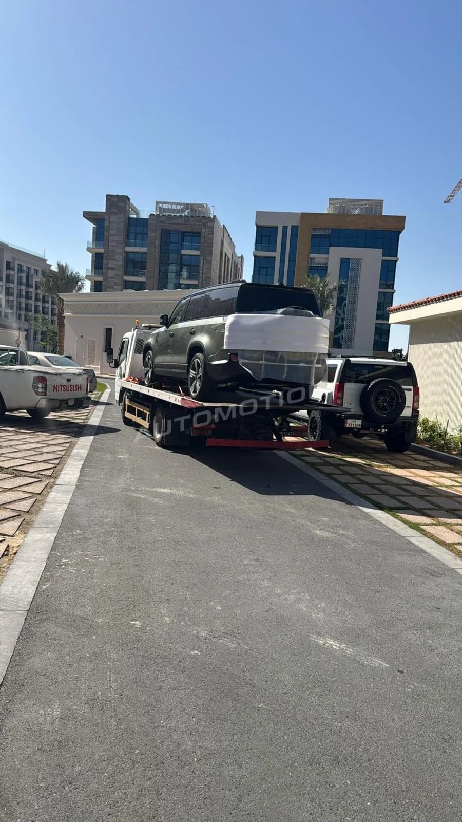 Delivery photograph 24 of 24, a vehicle loaded in a shipping container